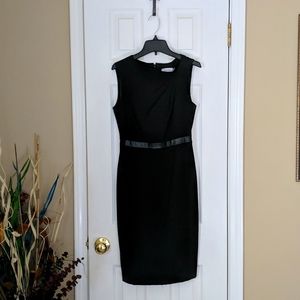 Dress By Calvin Klein size 2. Black with Black leather parts.